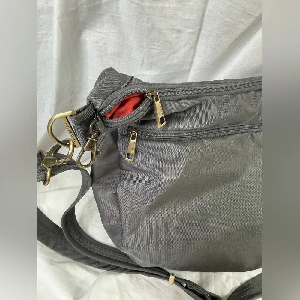 TRAVELON ANTI-THEFT‎ GRAY/BURNT ORANGE ROUND HOBO RFID, Gently Used